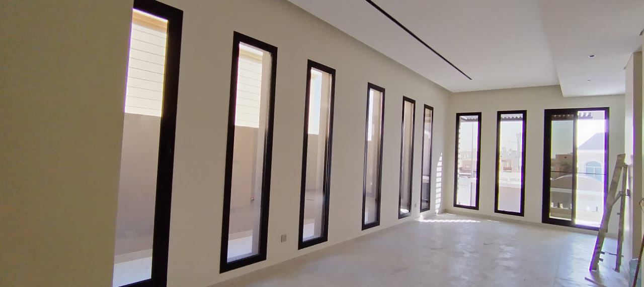 Natural stone cladding on a luxury building facade with precise joint detailing